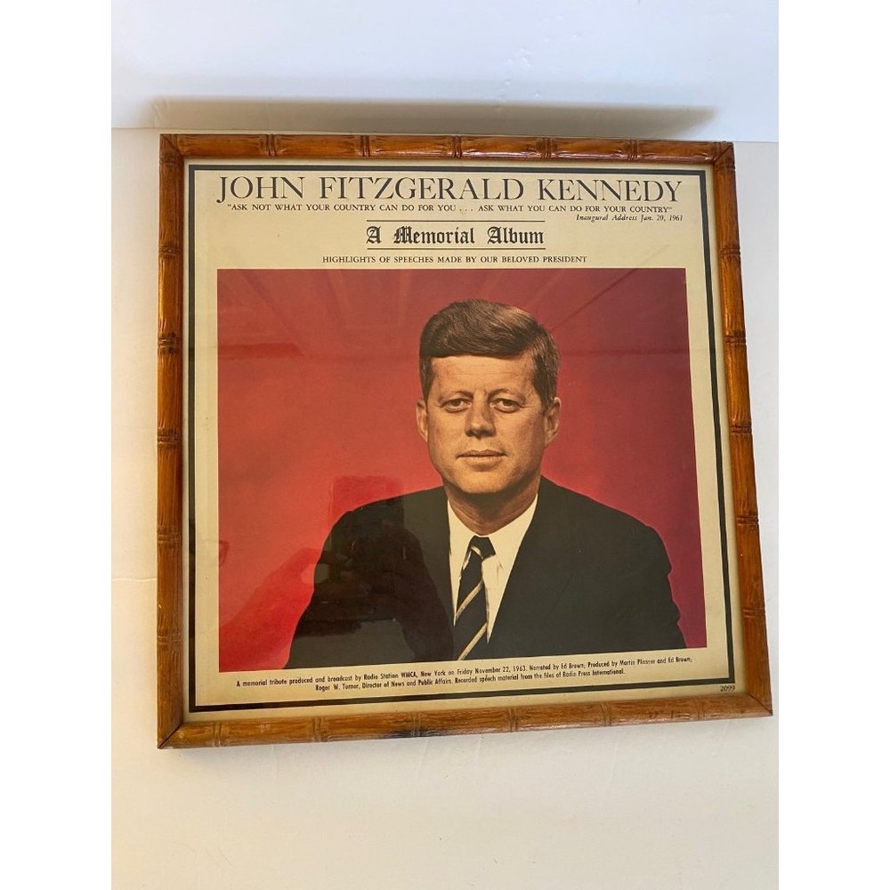 John Fitzgerald Kennedy: A Memorial Album made  in a frame.